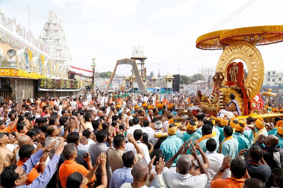 Devotees celebrating Tirumala Brahmotsavam during temple chariot procession