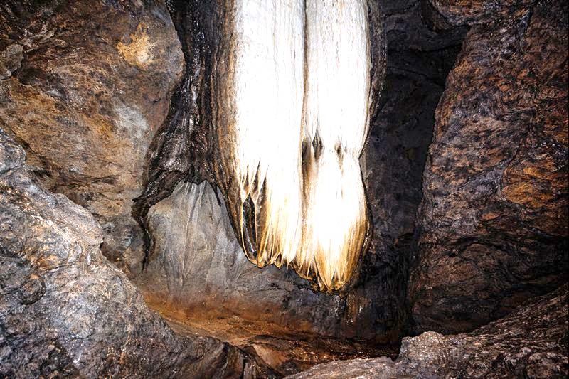 Natural rock formations symbolising Shiva energy inside Patal Bhuvaneshwar cave