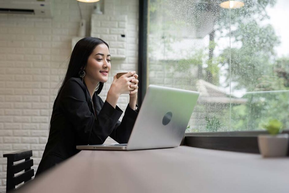 Calm corporate professional taking mindful work break after workplace burnout recovery.