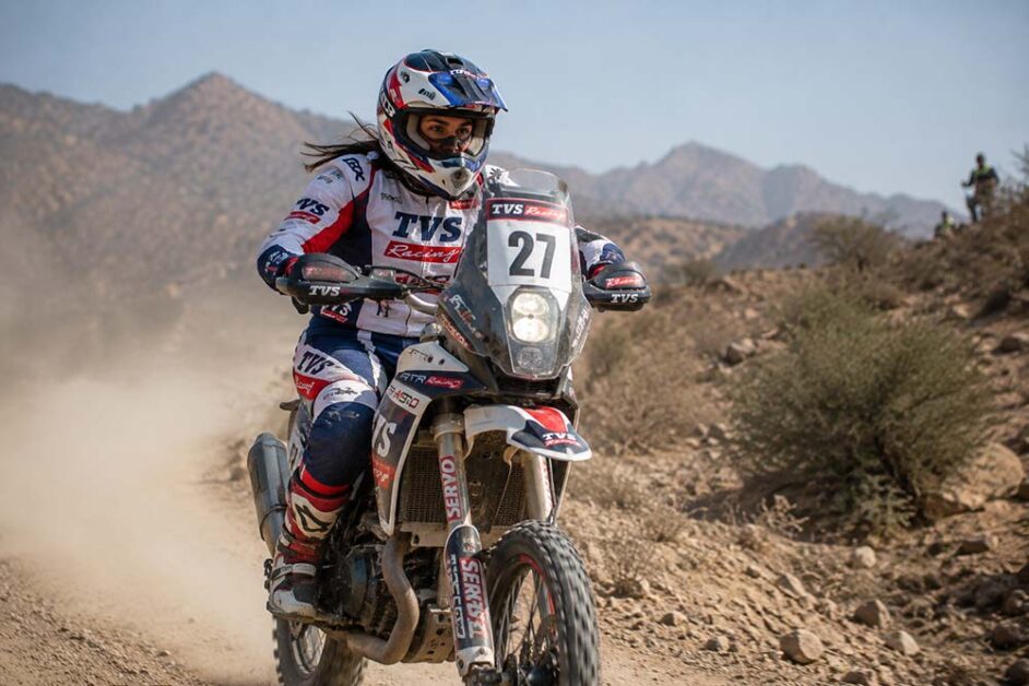 Woman rally racer competing in desert motorsport event India