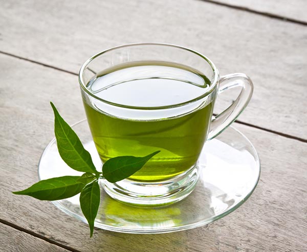 Drinking green tea, a natural weight-loss elixir.