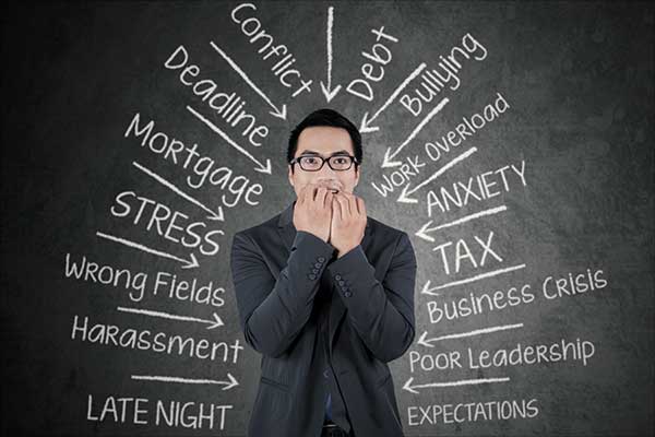 Depressed business person facing challenges: Stress at work