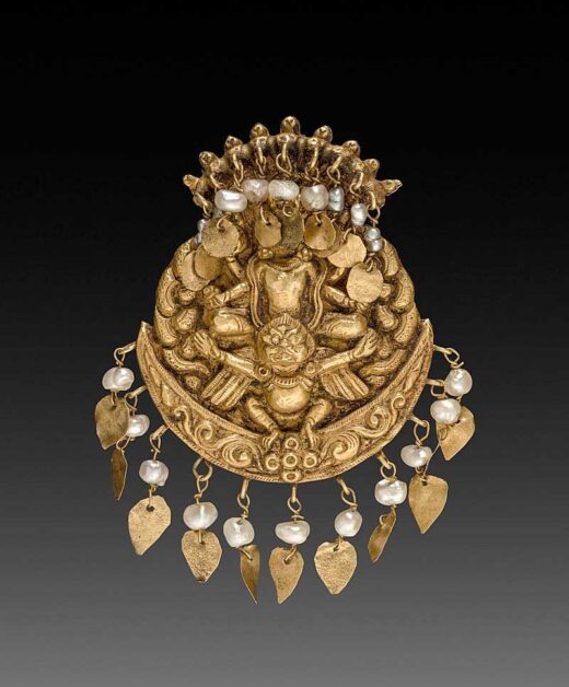 Antique earring from Nepal featuring Vishnu on Garuda with Nagas