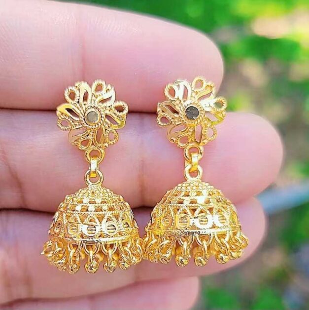 Gold jhumkas: Classic Indian jewelry featuring traditional small bell design