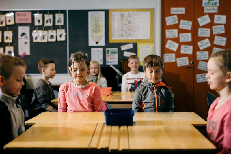 Students practicing mindfulness in school for better decision-making.