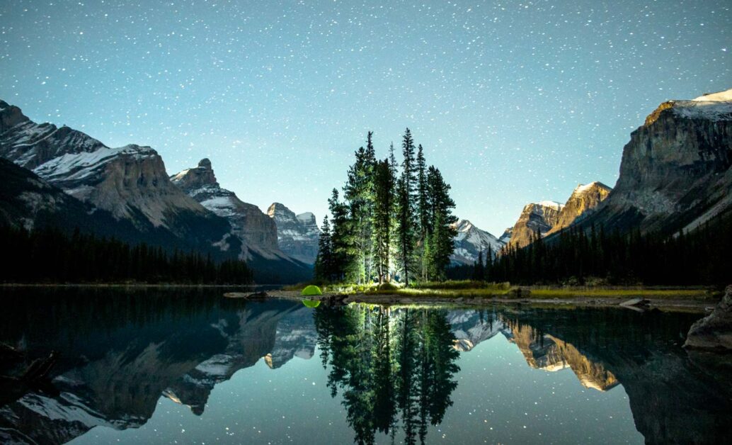 Chris Burkard's breathtaking shot of starlit mountain reflections.