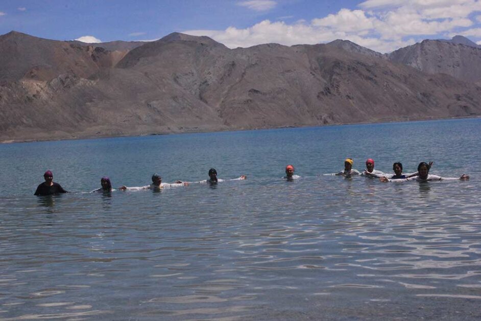 Team swimming in Pangong Tso’s icy waters