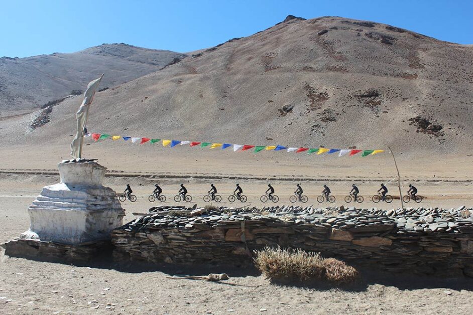 Indian Air Force cyclists riding through rugged mountain terrains