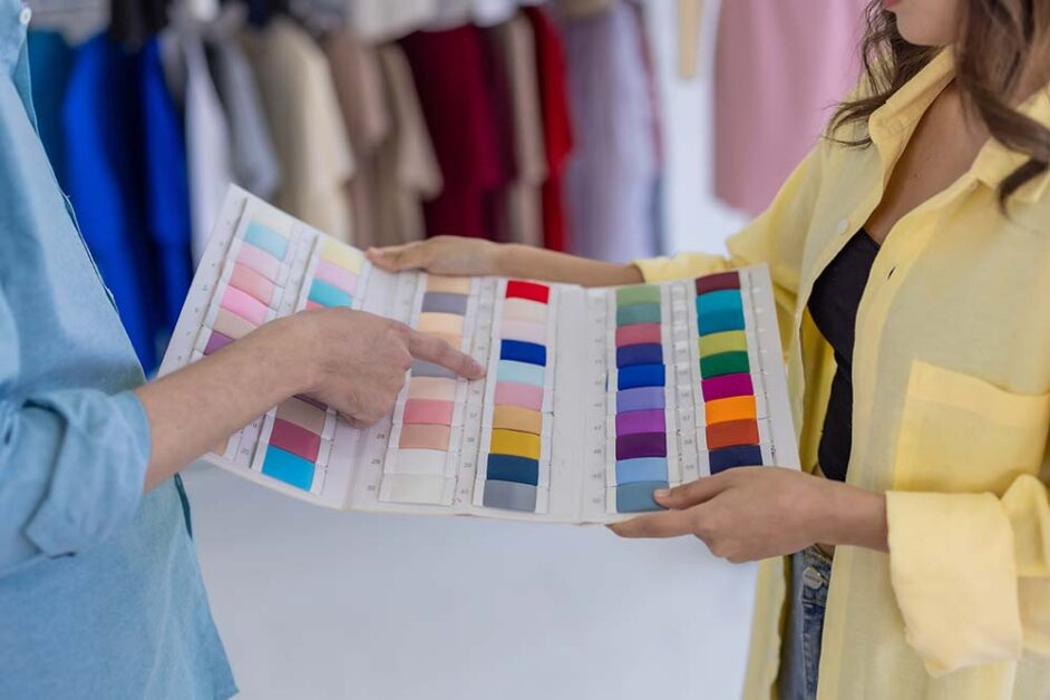 Designer and client discussing color palette for custom wardrobe design