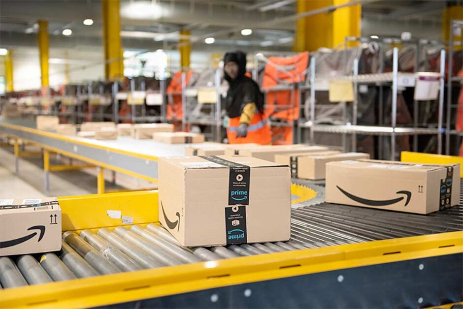 Amazon fulfillment center processing packages for global shipping efficiency.