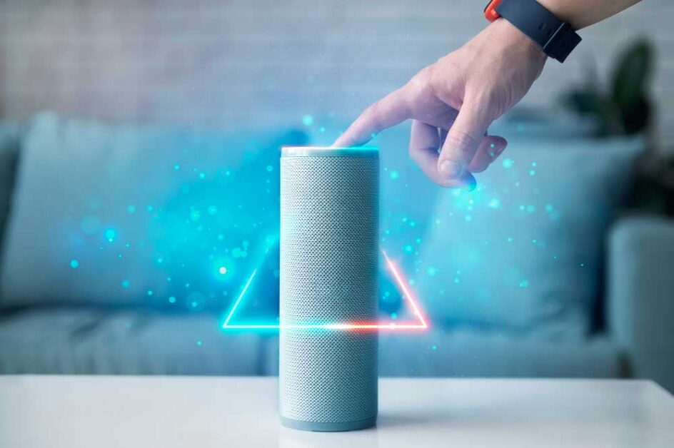 Hand pressing smart speaker for seamless voice assistants home interaction