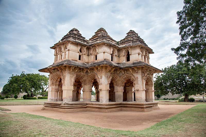 Elegant Lotus Mahal in Hampi, showcasing Indo-Islamic architectural influence.