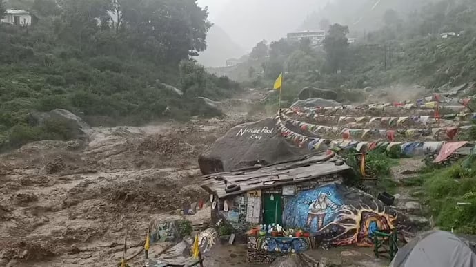 Flash floods gushing through Khaneria village in Himachal Pradesh Kangra district