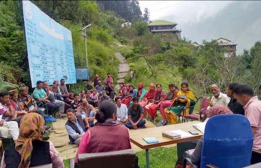 A gram sabha in progress for community awareness