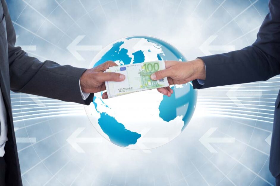 Two businessmen exchanging euro notes with world map background