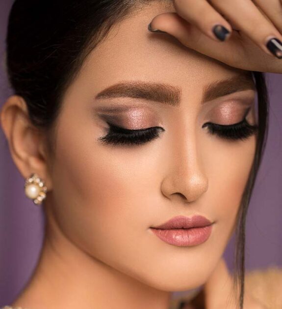 Soft glam nude makeup with defined eyes for weddings