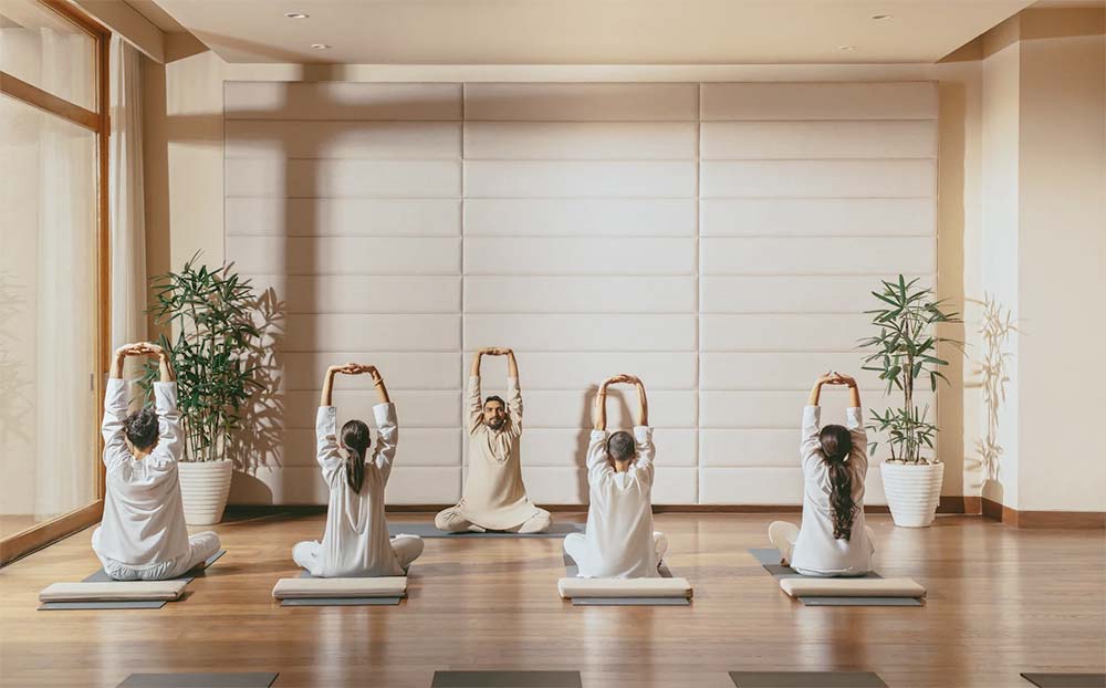 Guests practicing yoga at Vana Retreat Dehradun wellness resort