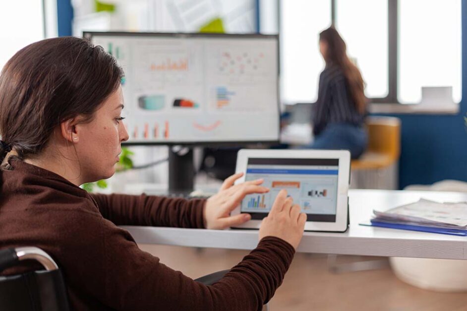 Professional reviewing AI analytics dashboard for institutional readiness and academic governance