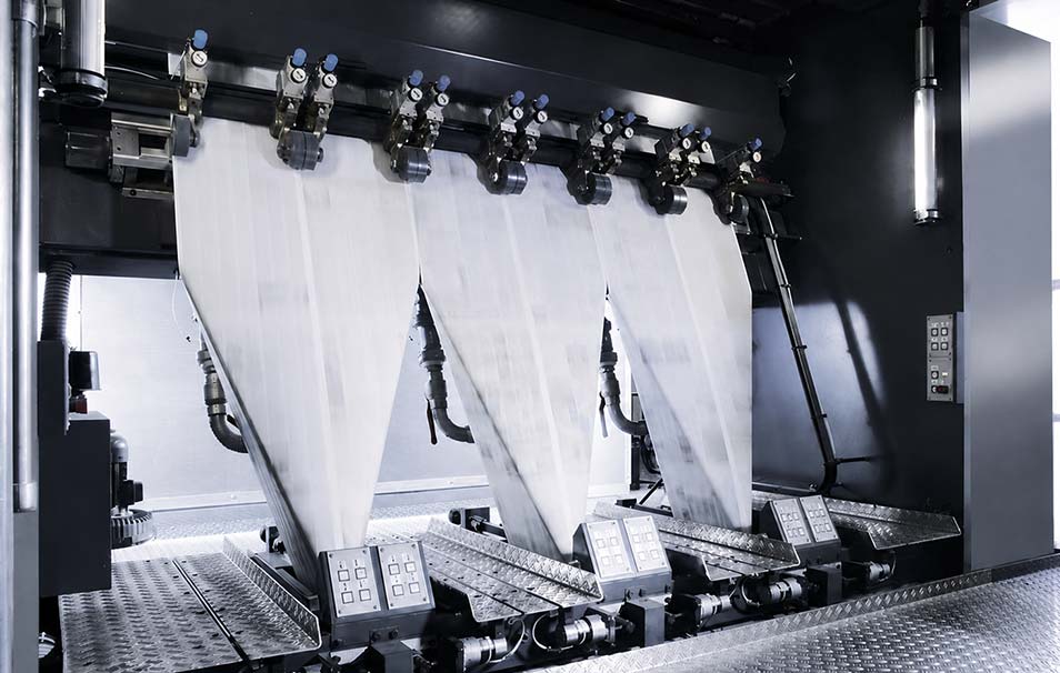 Commercial printing floor showing press and downstream finishing workflow operations today